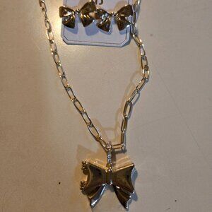 Gold bow charm necklace on paperclip chain & bow earrings